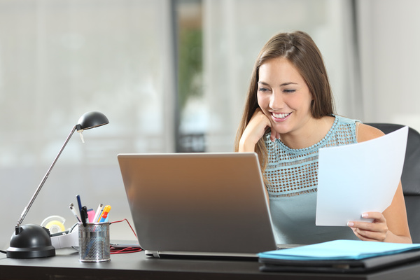 Girl-working-with-laptop-at-work-Stock-Photo-03